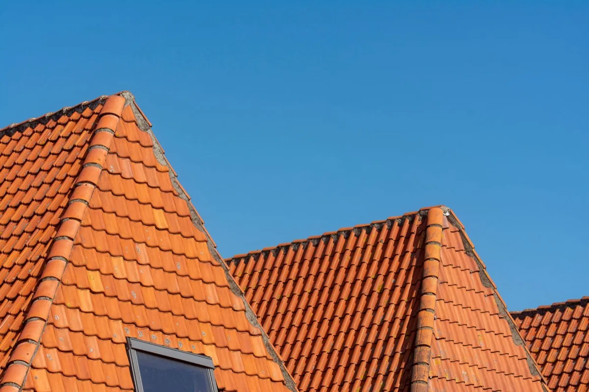 Clay barrel tile rooflines on homes in Sterling Heights, MI