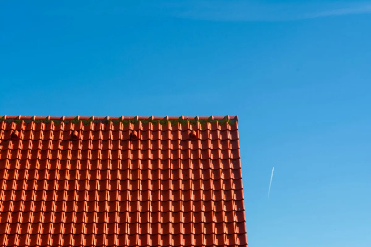 Tile roof gable in full sun, the kind of exposure that sets roof life in Sterling Heights, MI